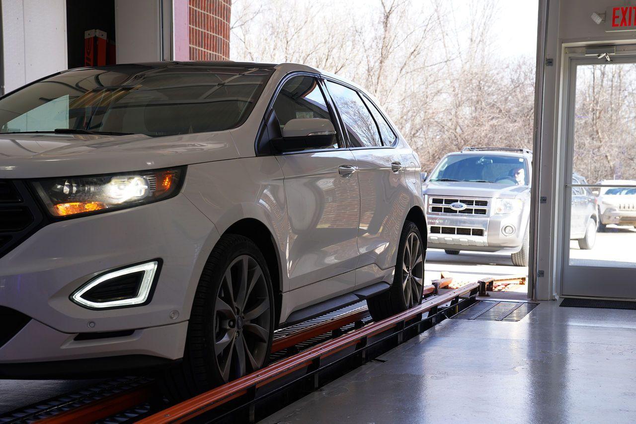 Tunnel car wash conveyor system